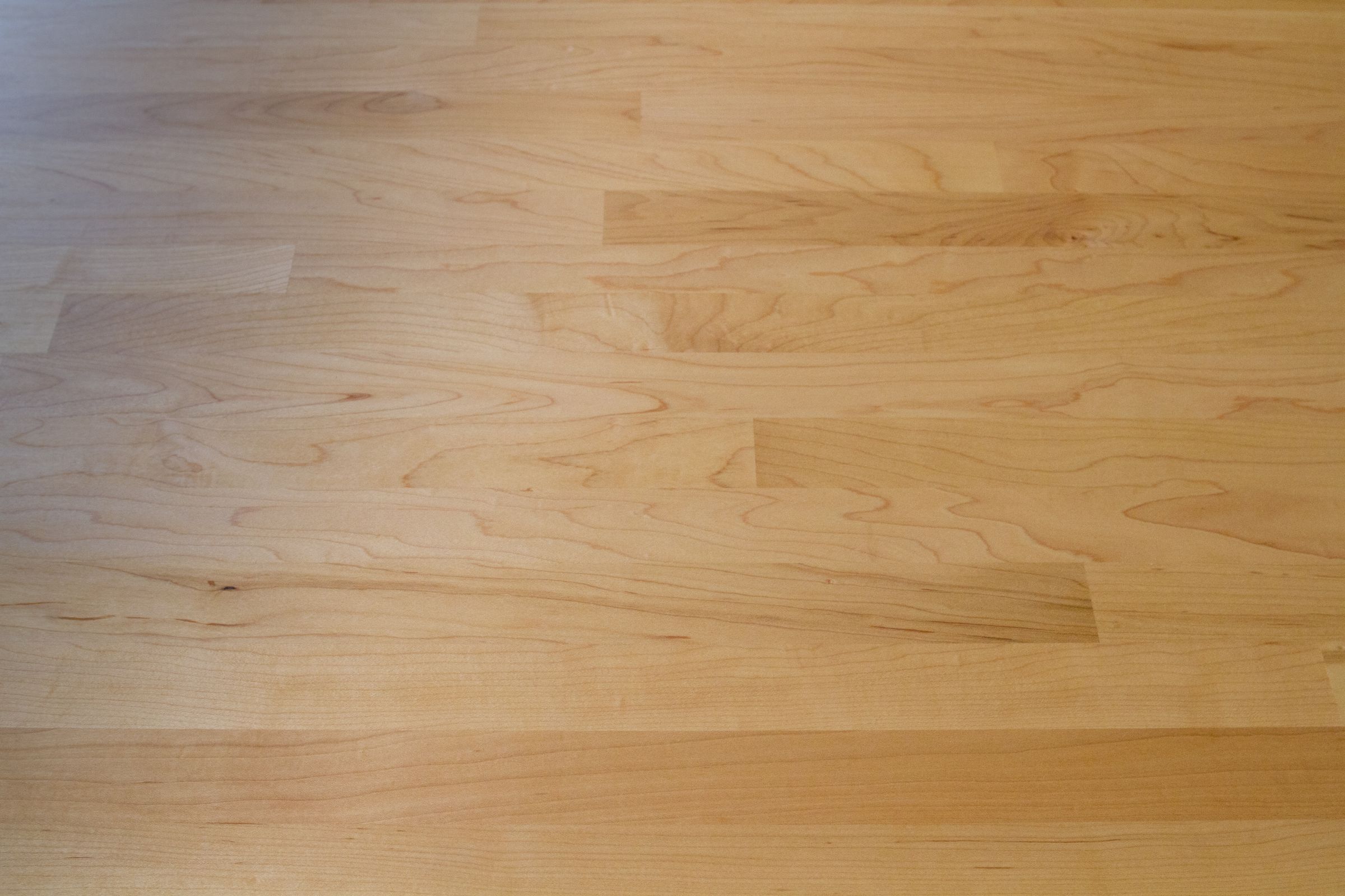 Light maple worktop surface showing fine grain and gentle warm hues