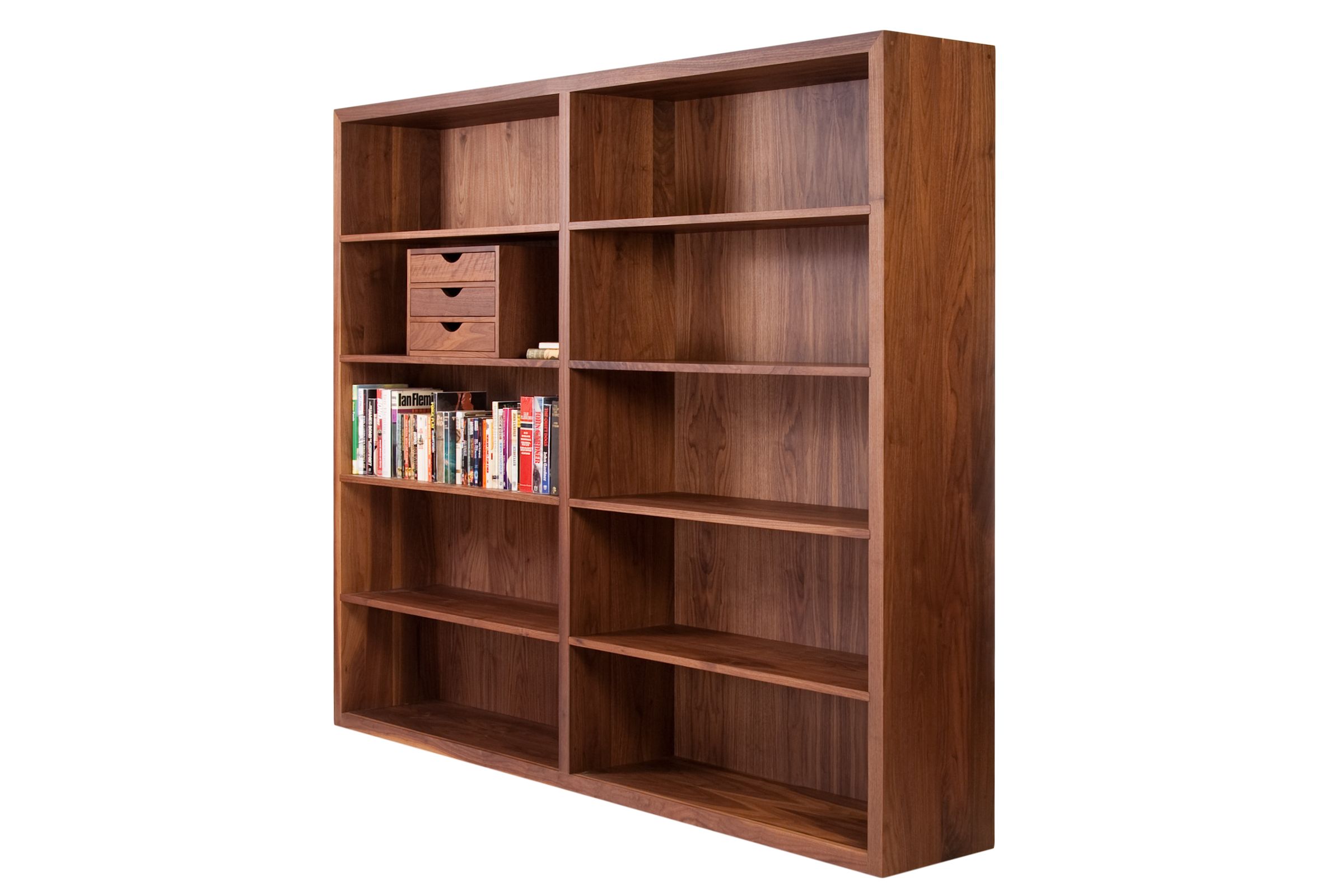 Large ten-shelf black walnut bookcase holding books and a small drawer box